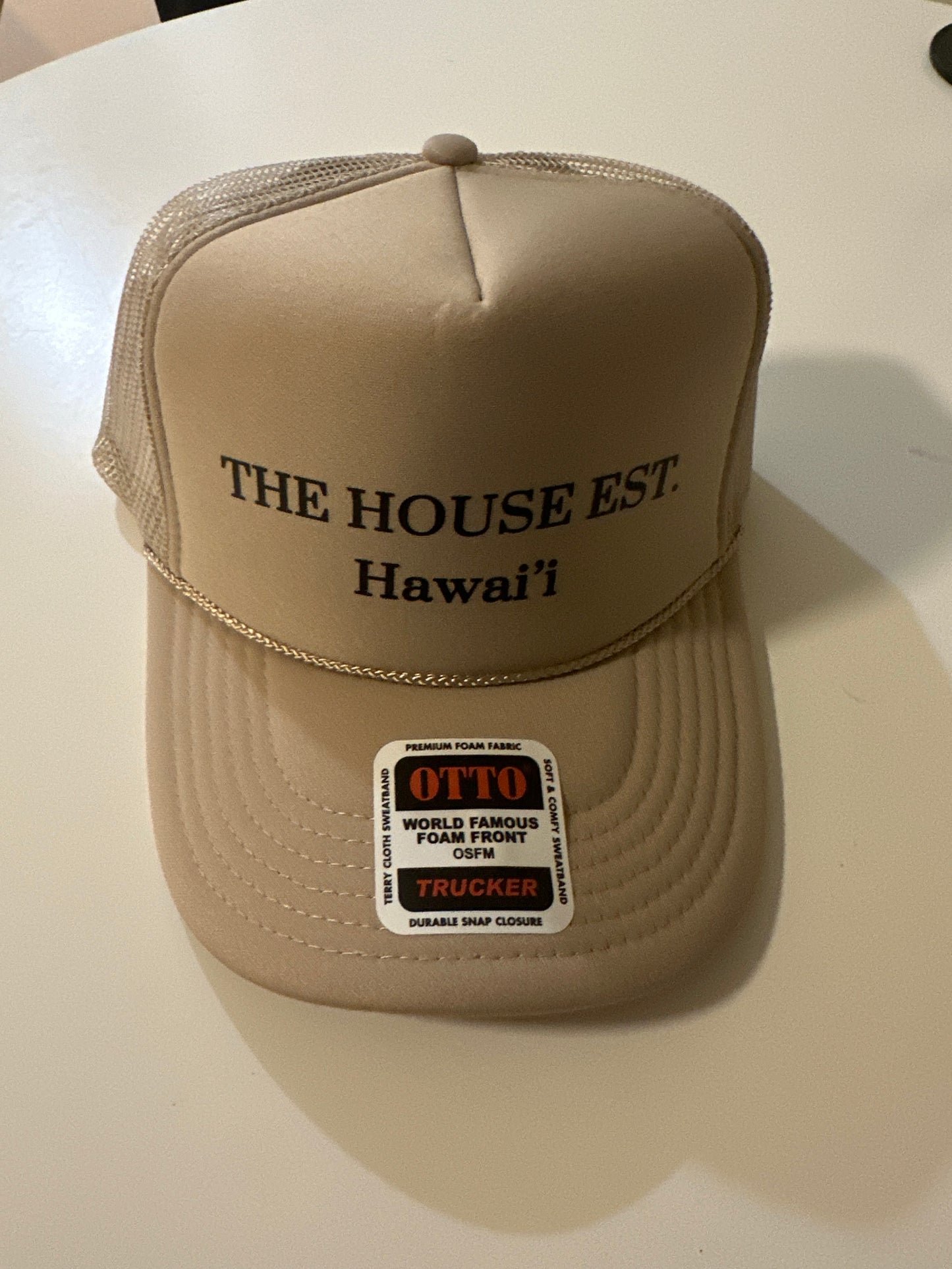 THE HOUSE EST. HAT